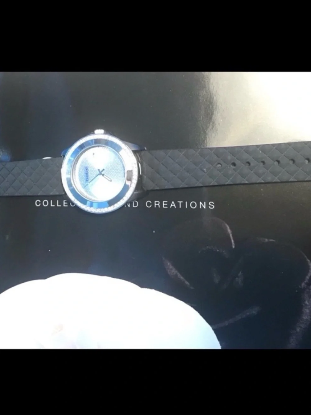 Bebe Silver Case Watch with Black Strap.